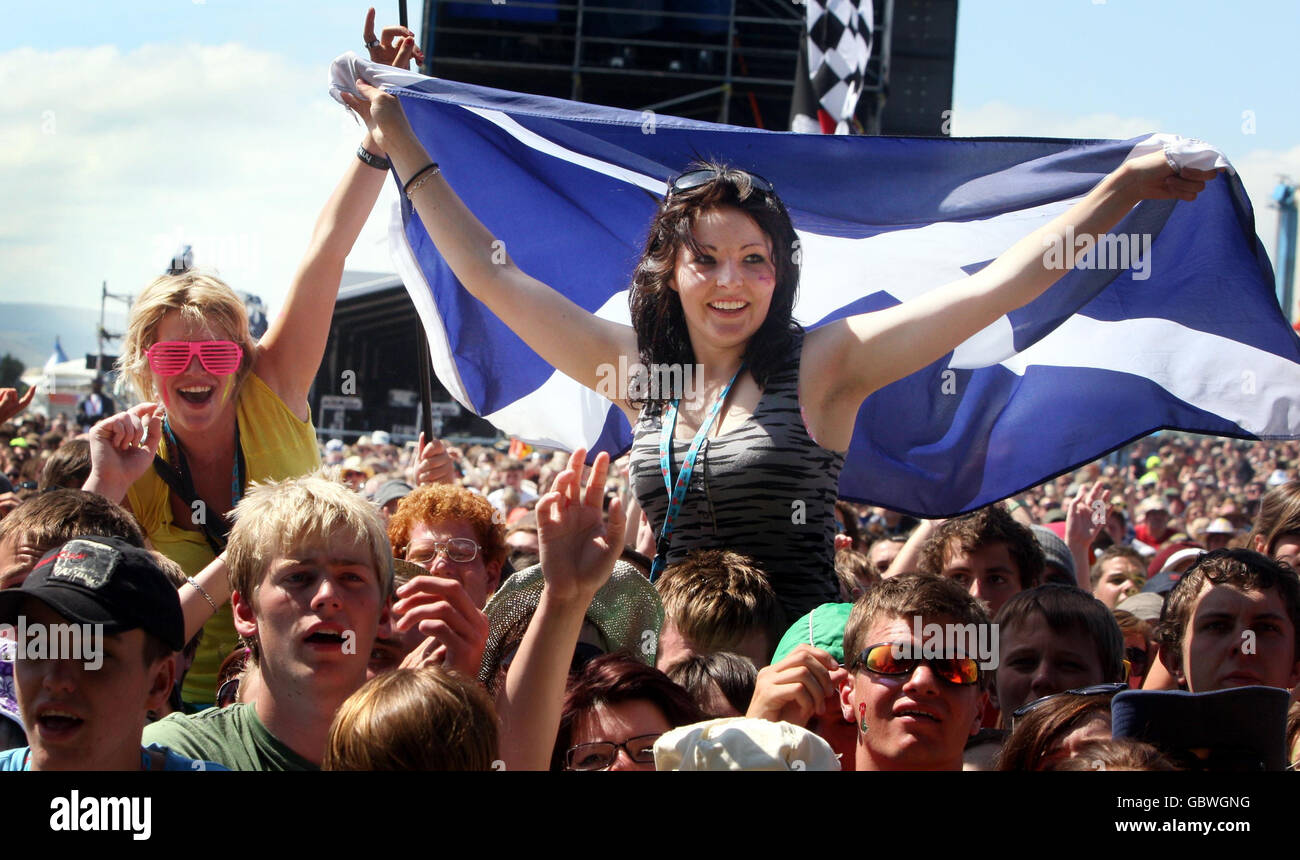 Festival goers watch Lady Gaga perform at the T in the Park music festival in Balado, Perth and Kinross. Stock Photo