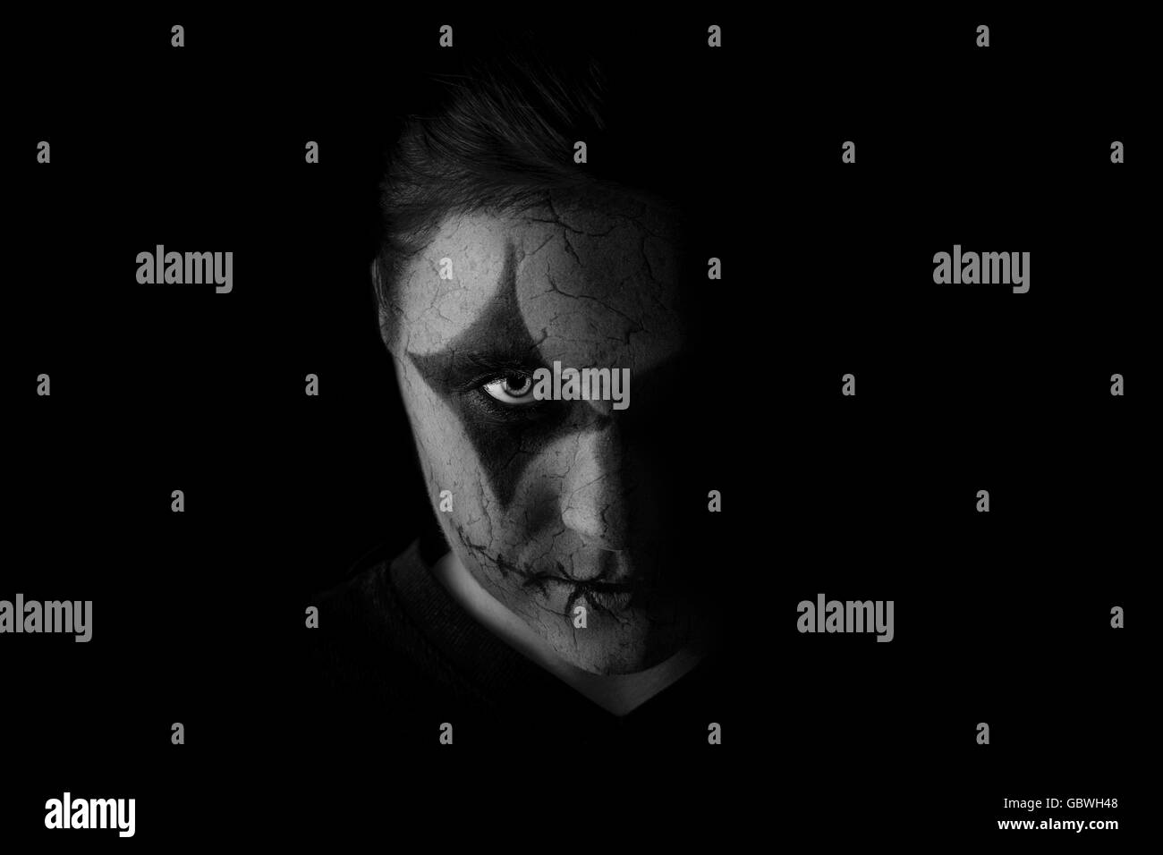 Half Face Photo of Man in Black Face Paint · Free Stock Photo