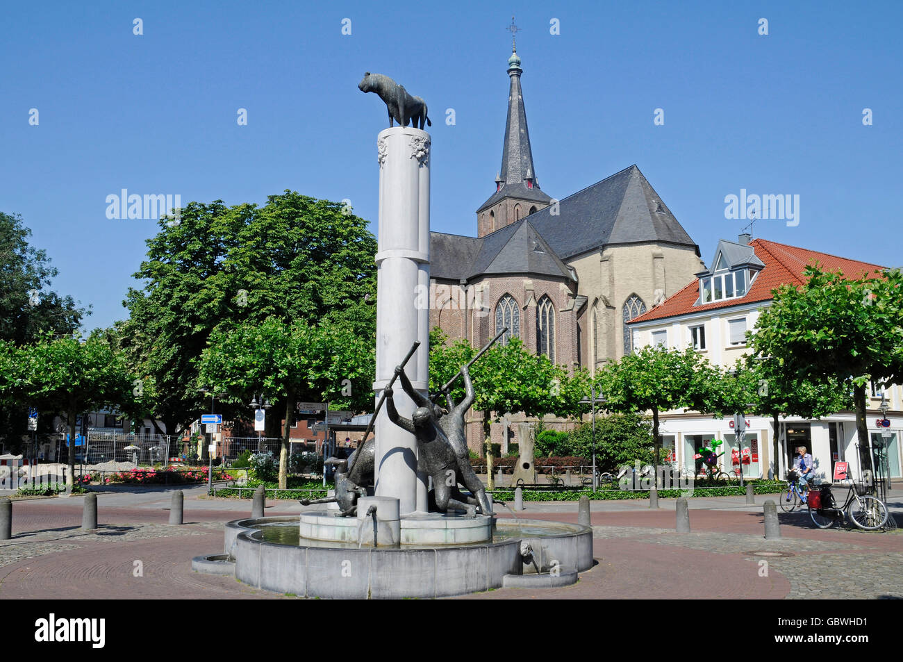 Dragon's Fountain, St Mary Magdalene Church, market square, Geldern, Lower Rhine region, North Rhine-Westphalia, Germany Stock Photo