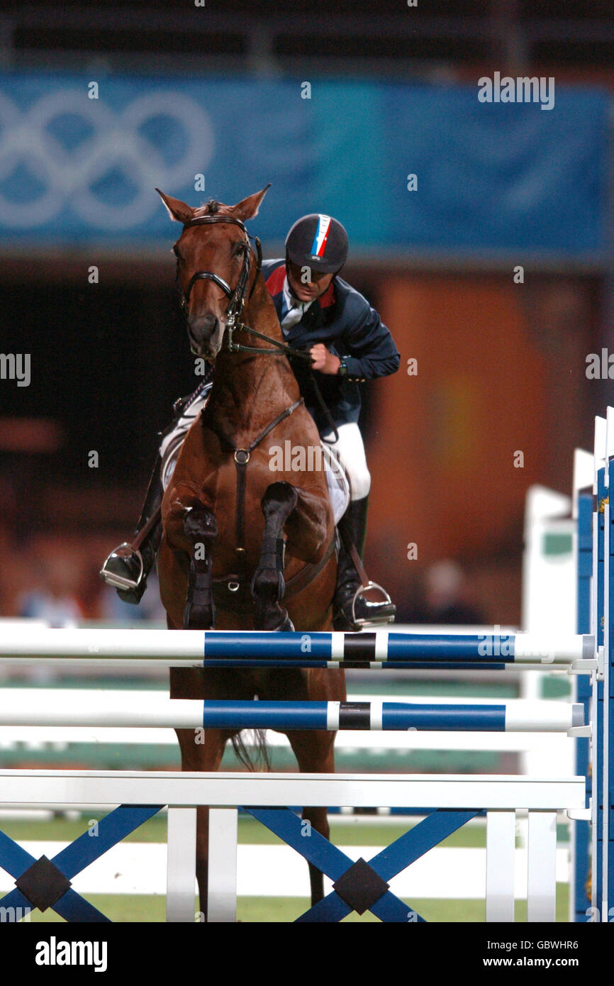 Equestrian - Athens Olympic Games 2004 - Three Day Eventing - Show Jumping - Individual Final. France's Jean Teulere on Espoir De La Mare Stock Photo