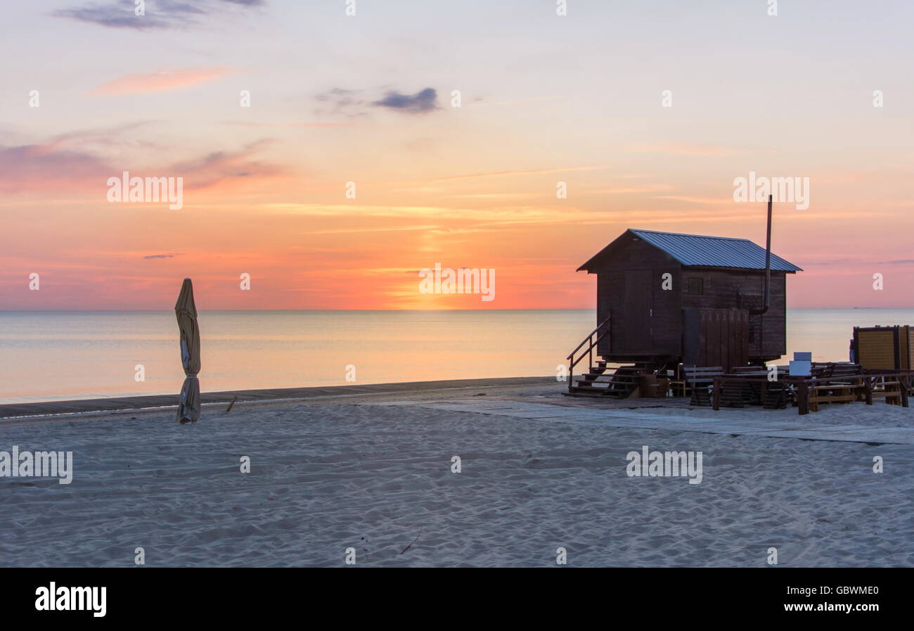 View at the Palanga sandy beach with lifeguard house. Palanga is the most popular summer resort in Lithuania Stock Photo