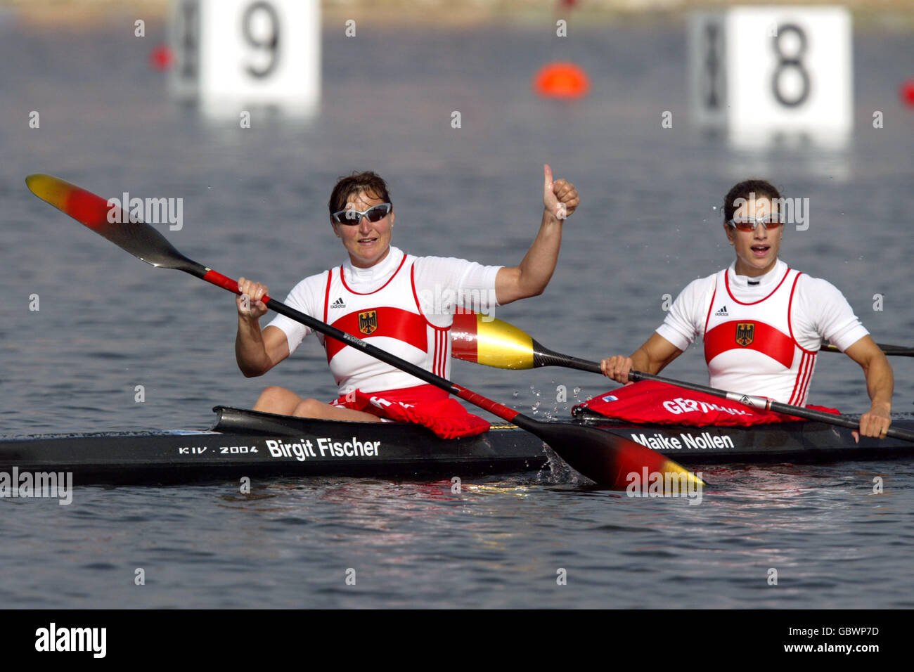 Canoeing - Athens Olympic Games 2004 - Flatwater Kayak Womens' K4 500m. Germany's Birgit Fischer (l) and Maike Nollen celebrate winning the gold medal Stock Photo