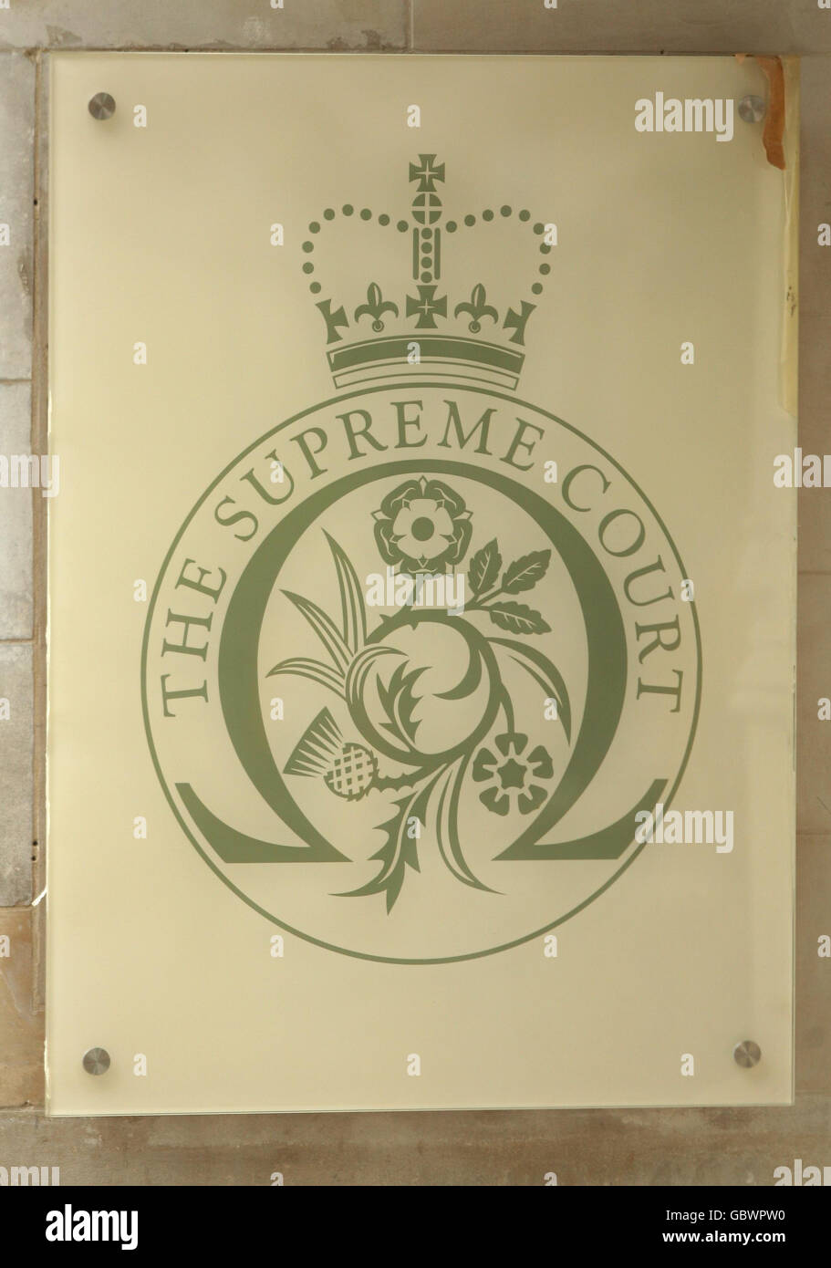 The badge of the Supreme Court of the United Kingdom, whose construction at the renovated Middlesex Guildhall in Parliament Square in central London, has until recently been hidden behind hoardings. Stock Photo