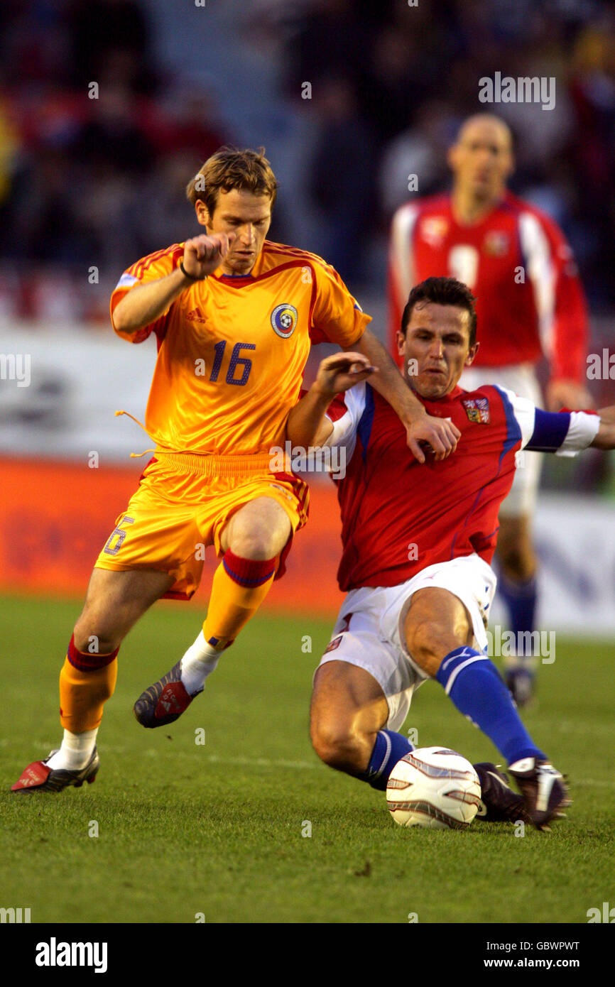 Soccer - FIFA World Cup 2006 Qualifier - Group One - Czech Republic v Romania. Czech Republic's Tomas Galasek and Romania's Florin Cernat battle for the ball Stock Photo