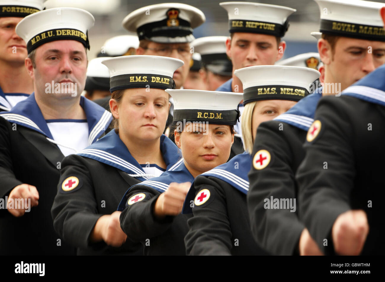 Members of the Royal Naval Medical Services parade pass their Commodore ...