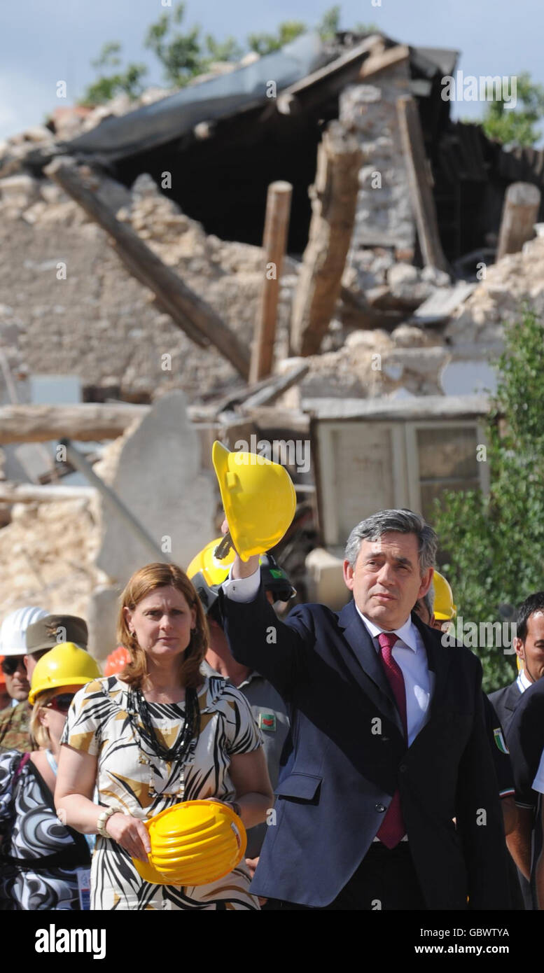 Prime Minister Gordon Brown (right) and his wife, Sarah Brown (left) visit the ruined village of Onna near L'Aquila, Italy which was at the epicentre of the earthquake which struck the region on April 6, 2009. Stock Photo