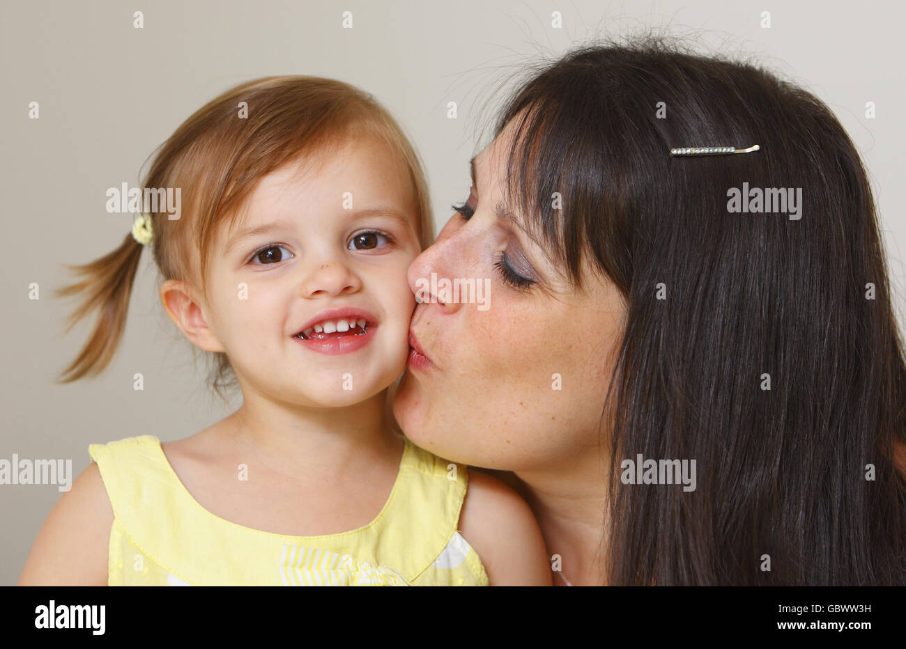 Two year old Isabelle Keeling at home in Bournemouth with her mum Joanne Keeling, 34, whose life she saved by calling paramedics after Mrs Keeling suffered a severe allergic reaction to latex. Stock Photo