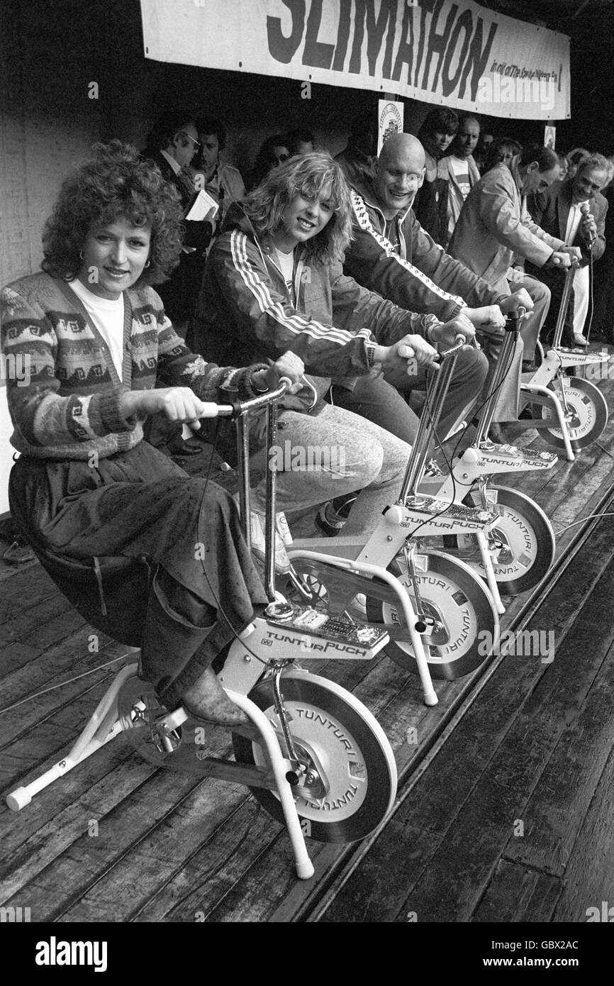 Left to right, singer Barbara Dickson, swimmer Sharron Davies, and swimmer Duncan Goodhew, taking part in an exercise bike race during the Slimathon gala at Battersea Park. The Slimathon is a sponsored slim to raise money for the Save the Children Fund. Stock Photo