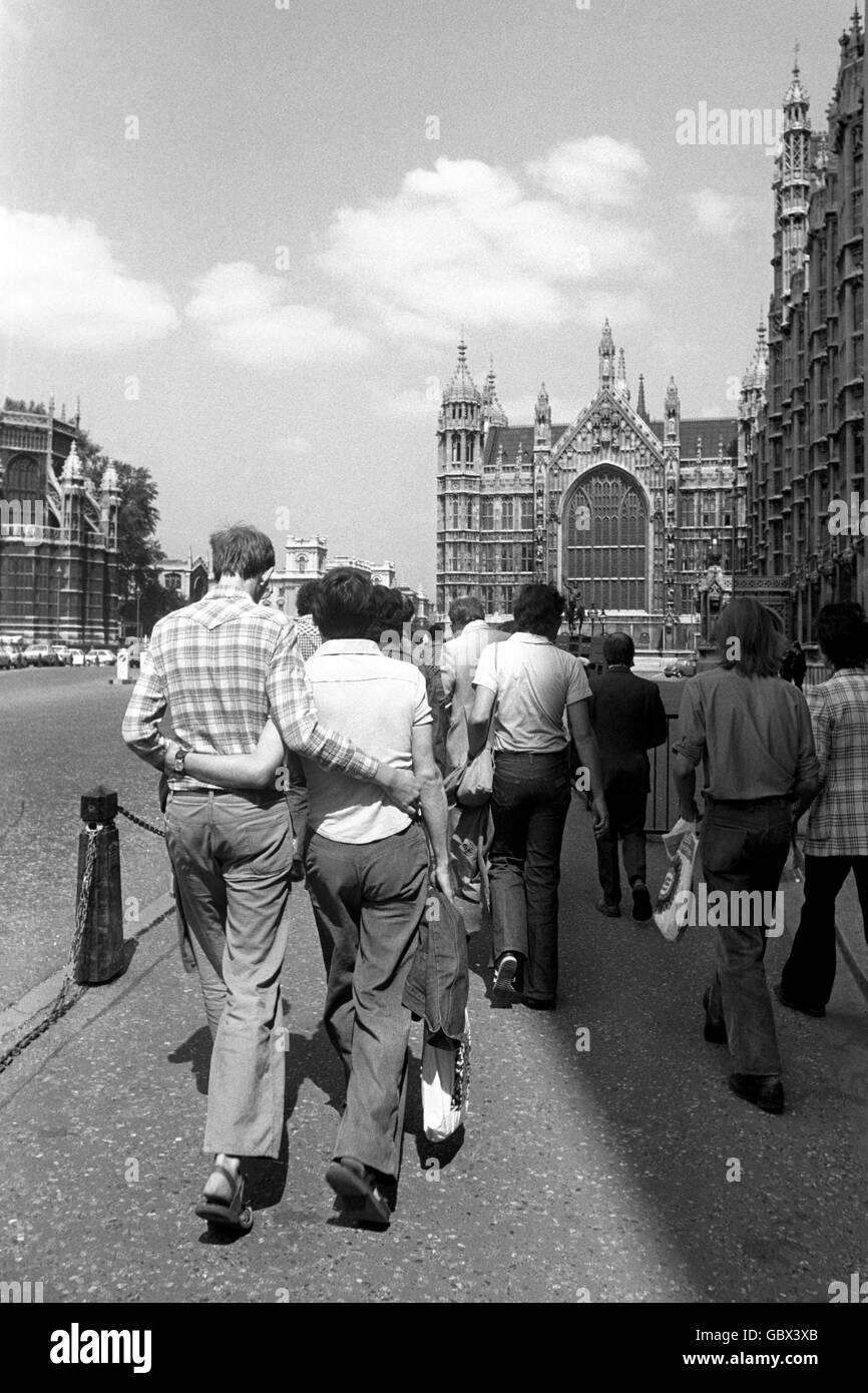 Members for the Campaign for Homosexual Equality (CHE) en route to lobby their MPs at the House of Commons, Westminster, after a picnic in the nearby Victoria Tower gardens, during Gay Pride Week. Stock Photo