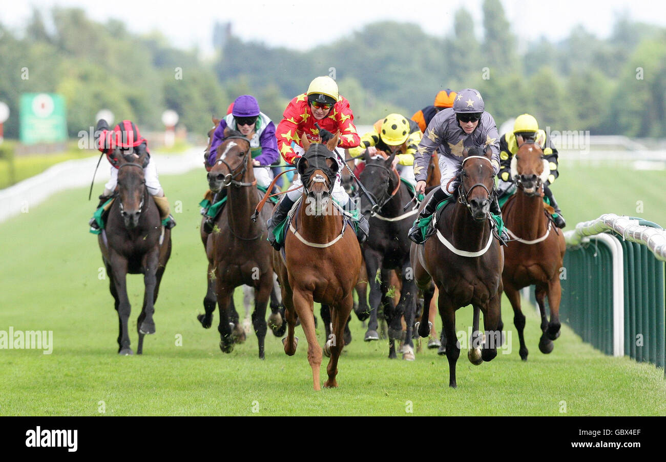 Red Merlin (centre) ridden by Philip Robinson wins the Bet365 Old Newton Cup Heritage Handicap during the bet365 Old Newton Cup Day at Haydock Park Racecourse, Merseyside. Stock Photo