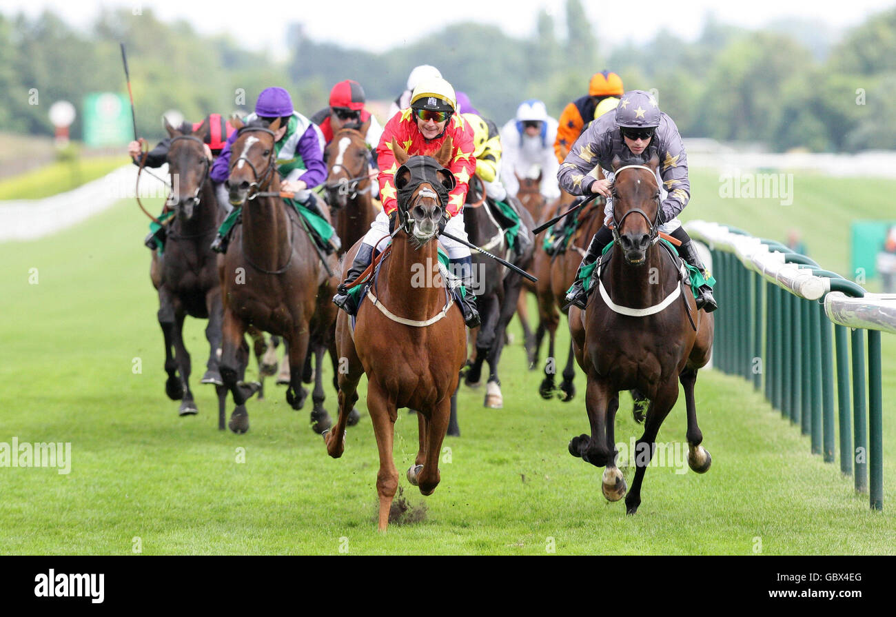 Red Merlin (centre) ridden by Philip Robinson wins the Bet365 Old Newton Cup Heritage Handicap during the bet365 Old Newton Cup Day at Haydock Park Racecourse, Merseyside. Stock Photo