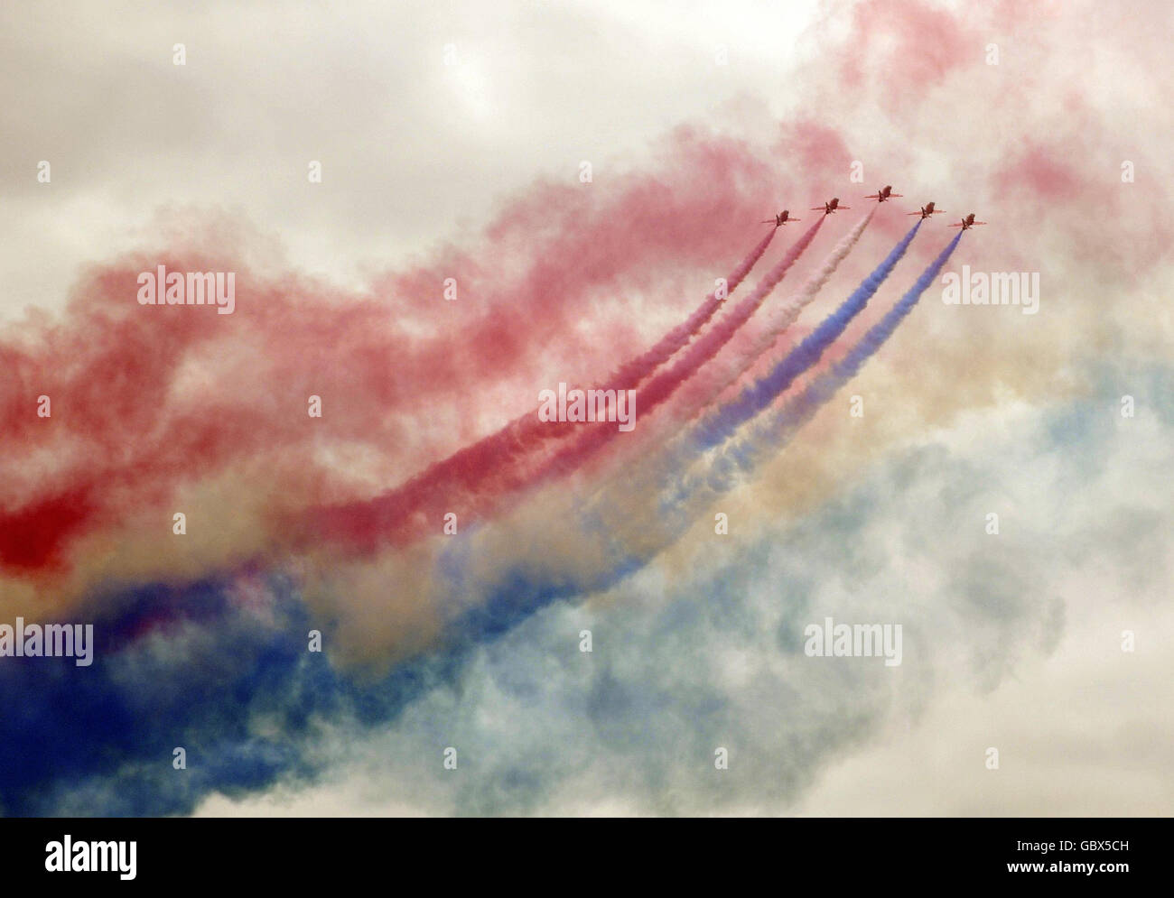 Auto - Goodwood Festival of Speed. The red Arrows fly overhead in formation during the Goodwood Festival of Speed in Chichester, West Sussex. Stock Photo