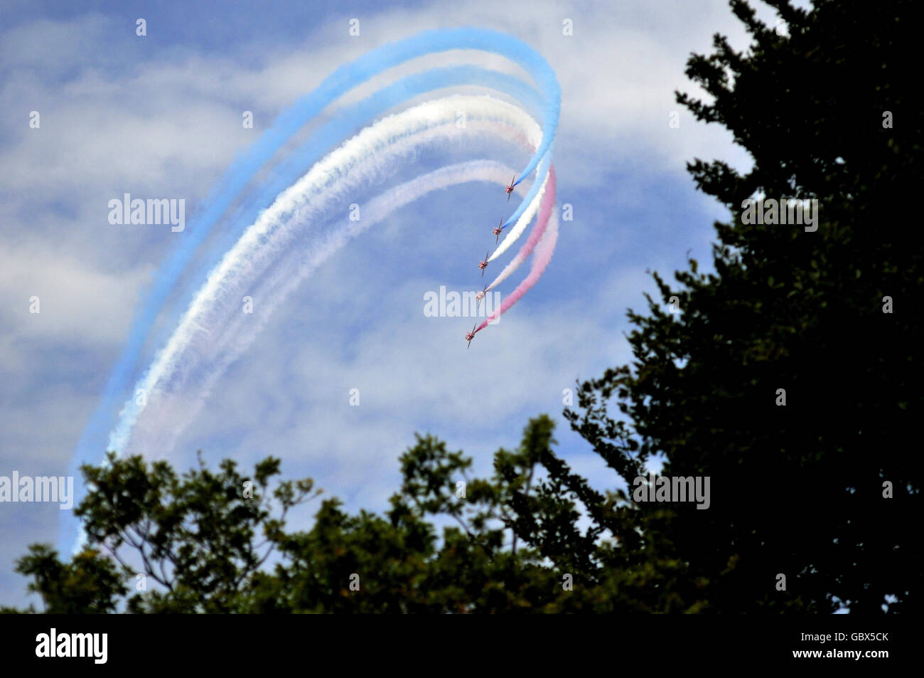 Auto - Goodwood Festival of Speed. The Red Arrows fly overhead in formation during the Goodwood Festival of Speed in Chichester, West Sussex. Stock Photo