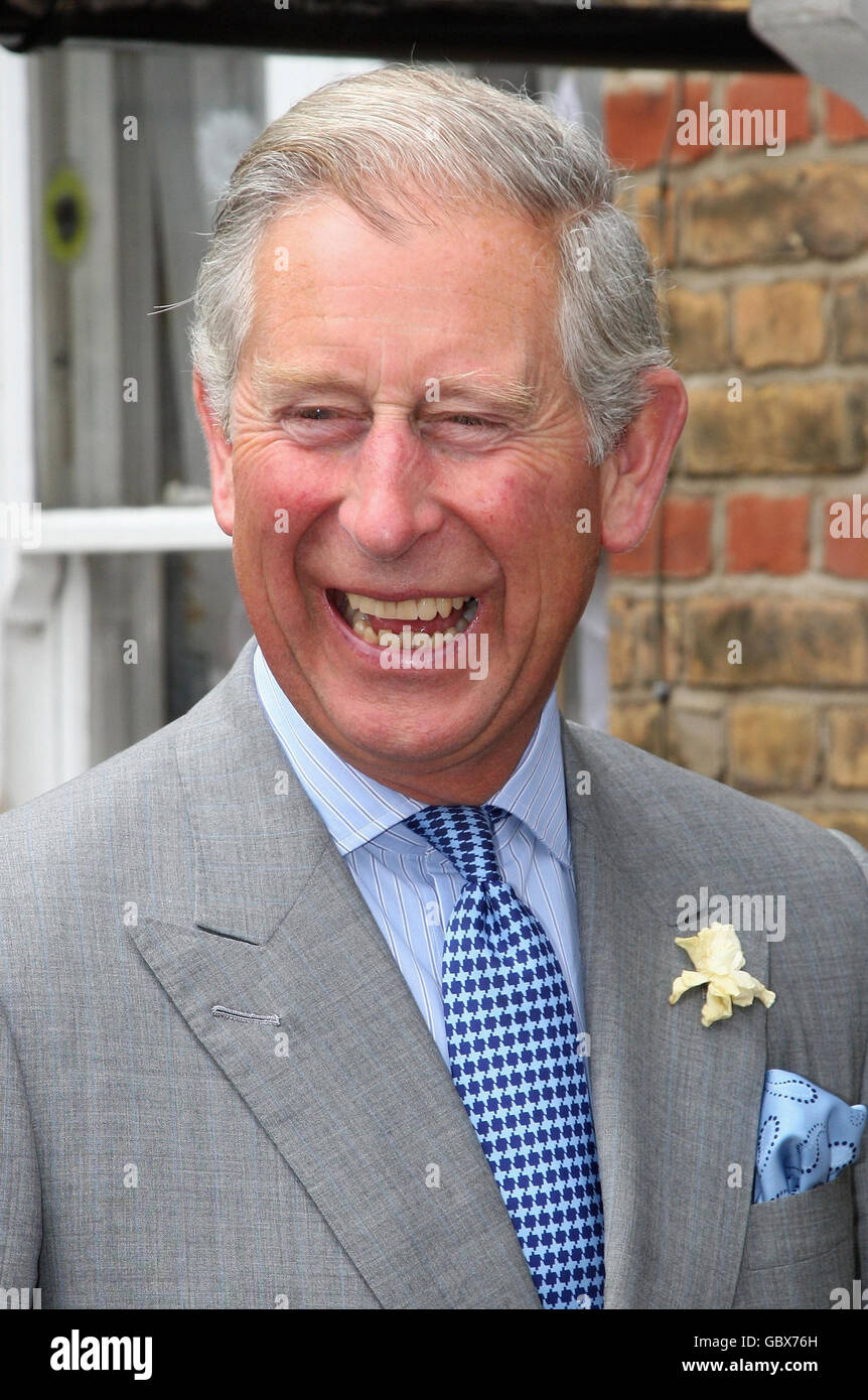 The Prince of Wales, centre, patron of the Almshouse Association, during a visit to St Pancras almshouses in north London to celebrate the 150th anniversary of the Almshouses. Stock Photo