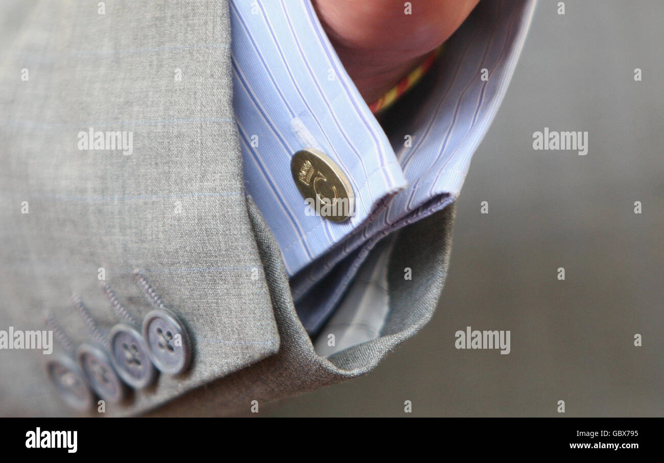 Gold cufflinks visible on the shirt of The Prince of Wales, patron of the Almshouse Association, during a visit to St Pancras almshouses in north London to celebrate the 150th anniversary of the Almshouses. Stock Photo