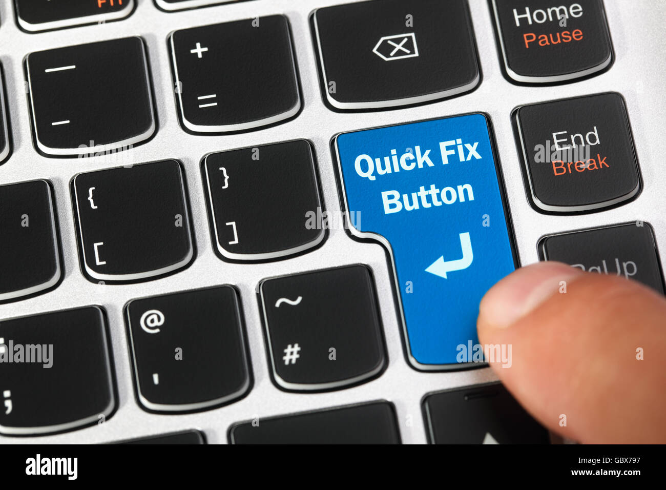 Computer keyboard enter key with a magic quick fix button concept for it support, technical assistance and customer service Stock Photo