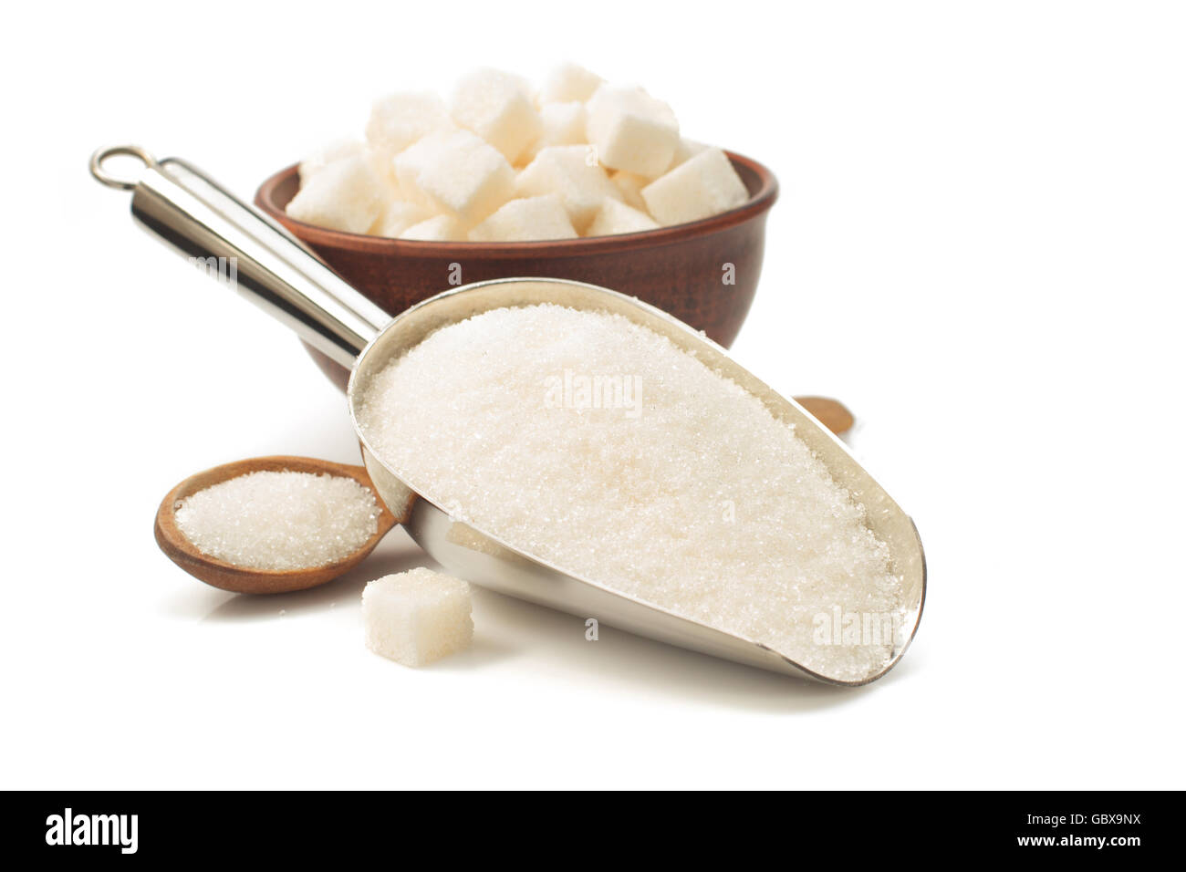 granulated sugar in scoop isolated on white background Stock Photo Alamy