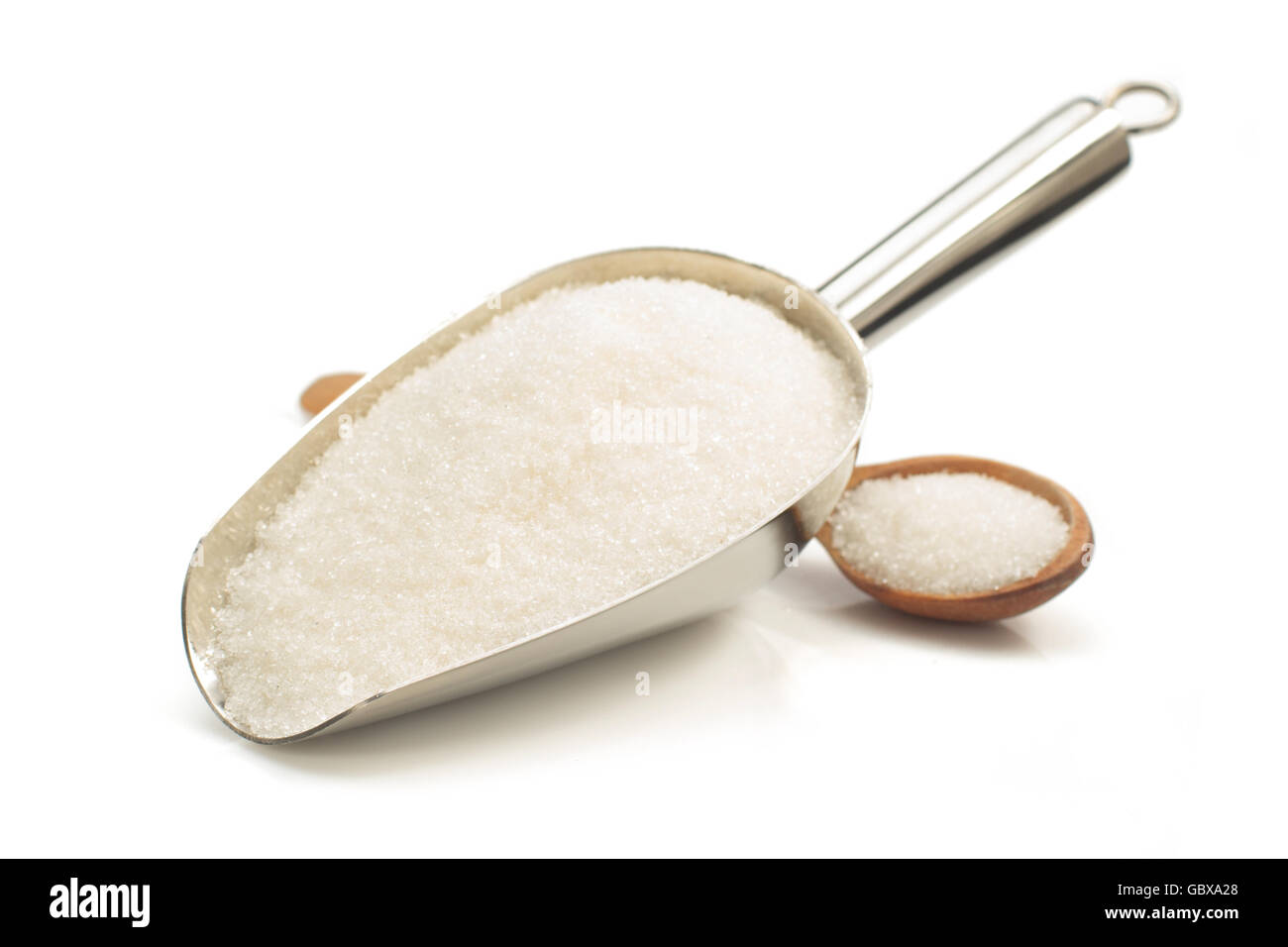 granulated sugar in scoop isolated on white background Stock Photo Alamy