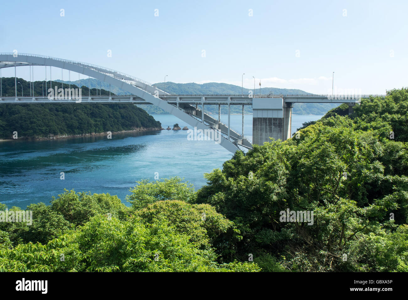 Omishima Bridge, a tied arch bridge, connecting the islands of Omishima and Hakata in the Seto Inland Sea, Japan. Stock Photo