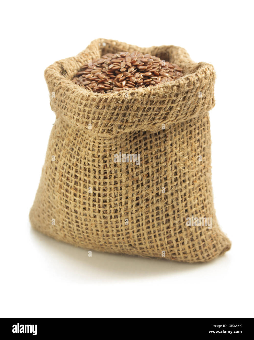flax seeds in bag isolated on white background Stock Photo Alamy