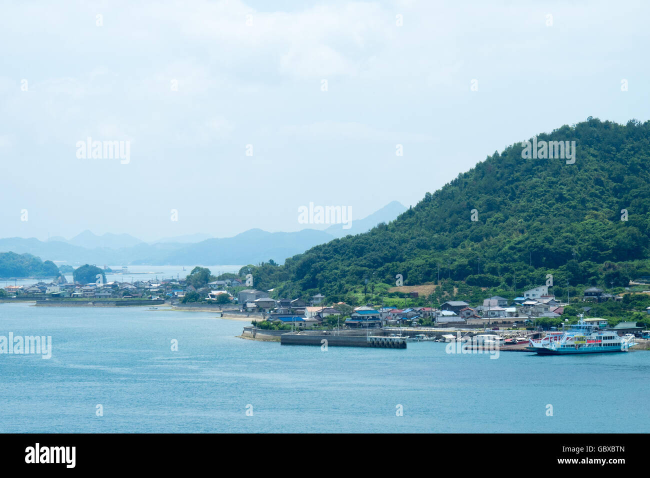 Boat harbour and seaside town of Nishiura on Innoshima Island, Japan. Stock Photo