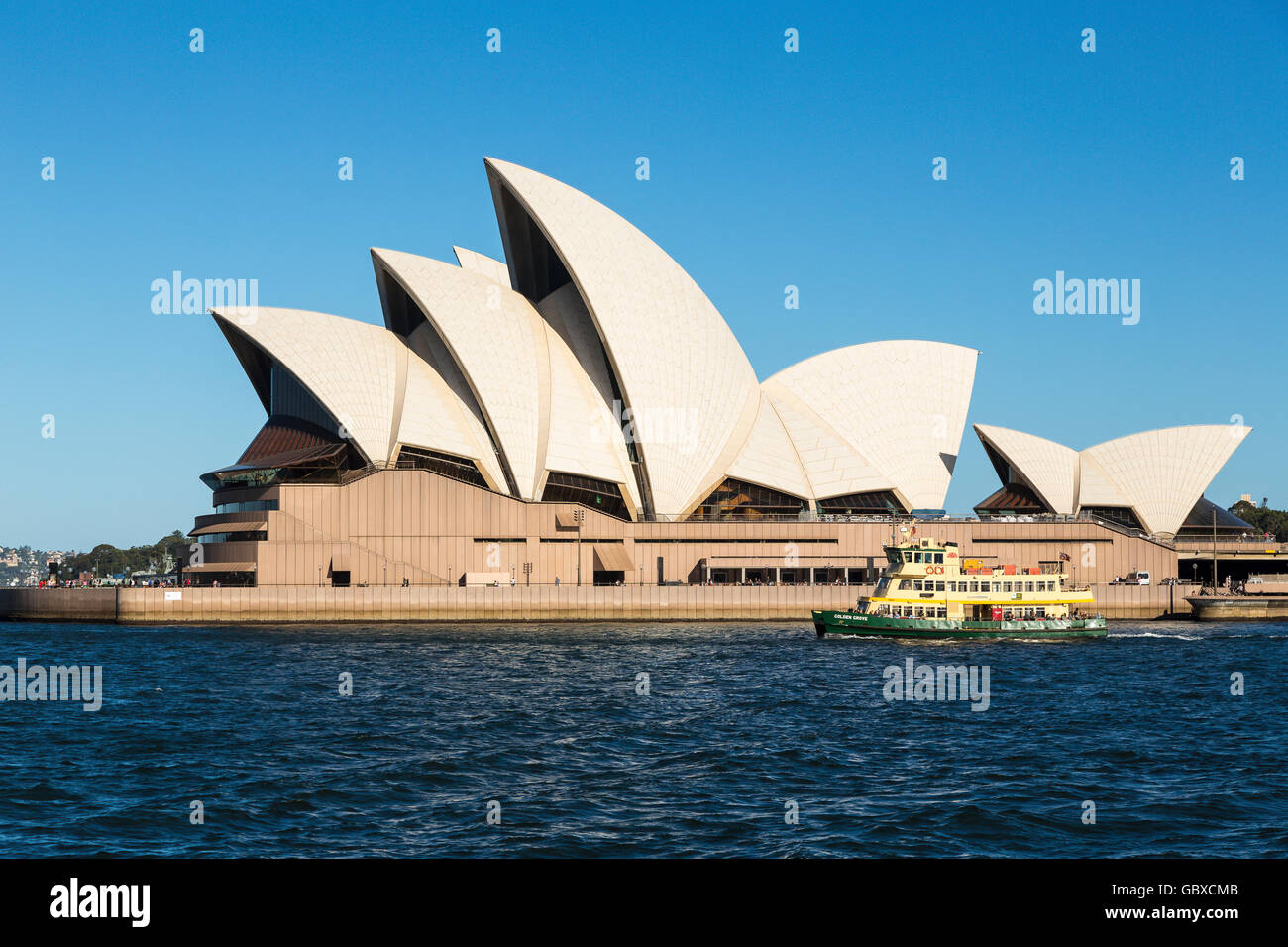Sydney ferry passes Opera House, Australia Stock Photo