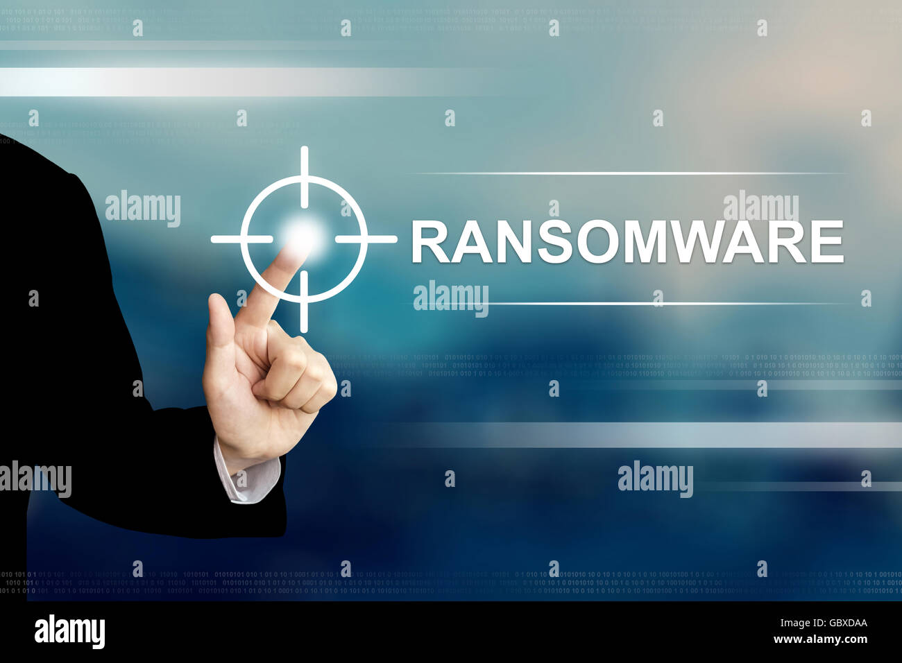 business hand pushing ransomware button on a touch screen interface Stock Photo