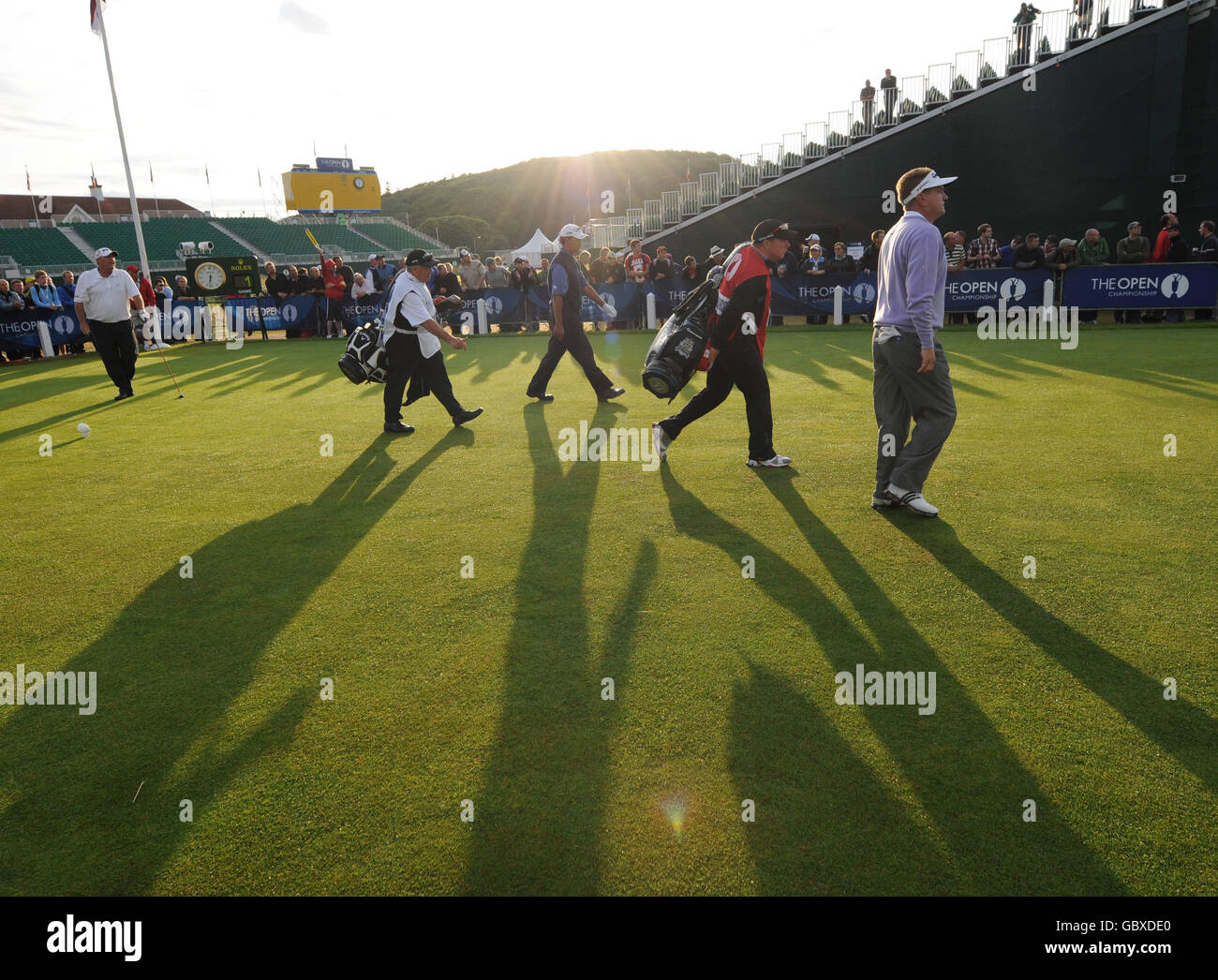 New Zealand's Michael Campbell (centre) England's Paul Broadhurst (right) and USA's Mark Calcavecchia (left) walk off the first after beginning the first round of the Open Championship 2009 at Turnberry Golf Club, Ayrshire. Stock Photo