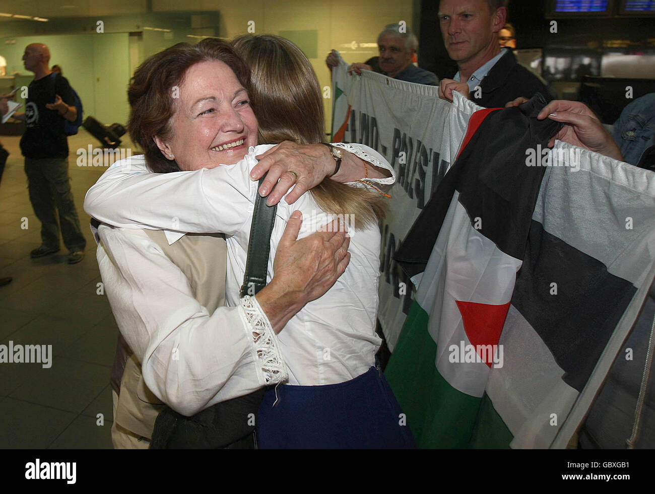 Nobel laureate Mairead Maguire is welcomed home by supporters at Dublin Airport, after she and former soldier Derek Graham were deported by Israel for attempting to bring aid to Gaza. Stock Photo