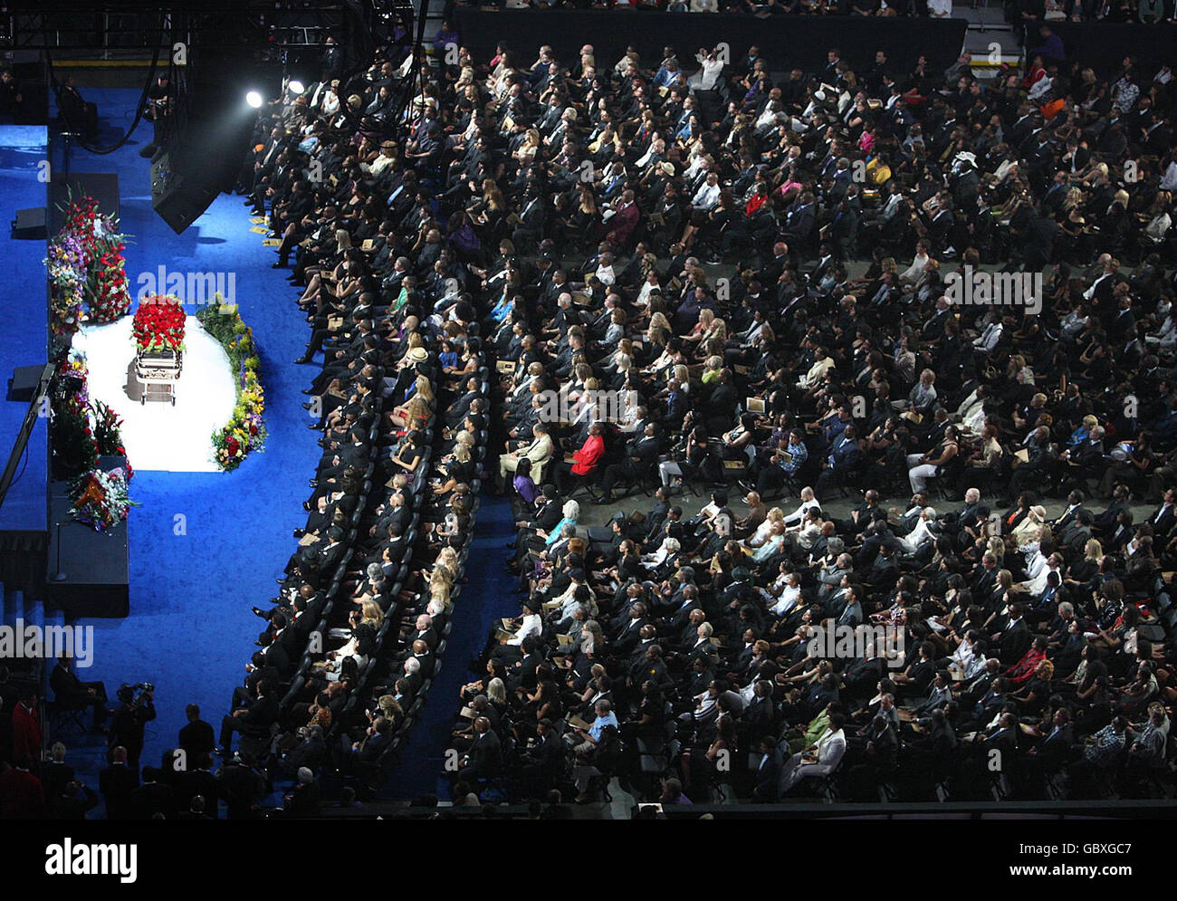 The rose covered coffin rests in the front of stage during a memorial service for Michael Jackson at the Staples Center in Los Angeles. Stock Photo