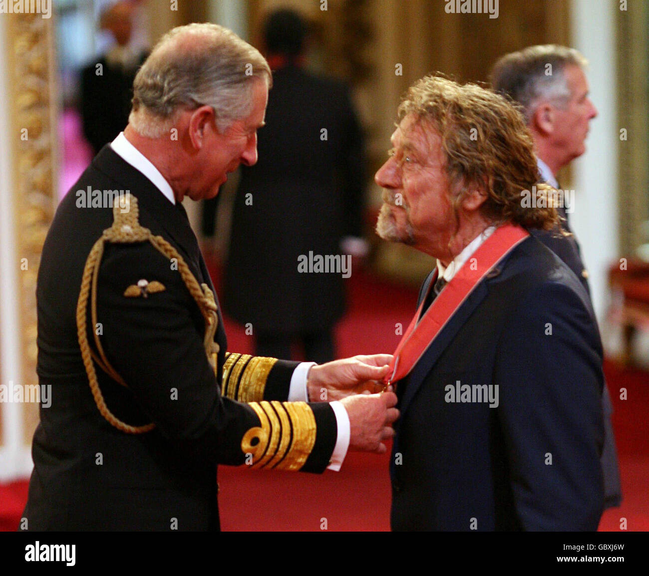 Former Led Zeppelin frontman Robert Plant receives his CBE from the Prince  of Wales during the investiture ceremony at Buckingham Palace Stock Photo -  Alamy