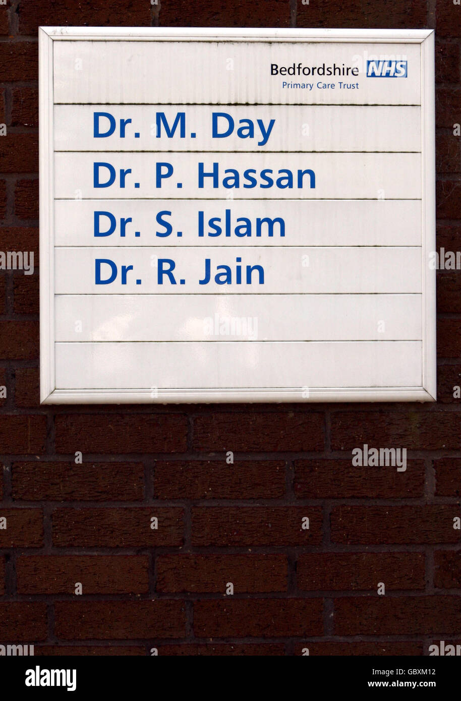 A sign on the wall of the Dunstable Health Centre in Dunstable, Bedfordshire, with the names of the serving doctors including that of Dr Michael Day who died of Swine Flu. Stock Photo