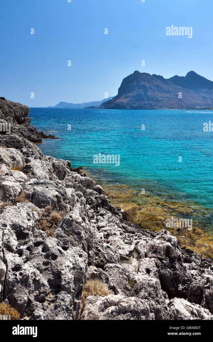 Kolymbia beach with the rocky coast in Greece. Stock Photo