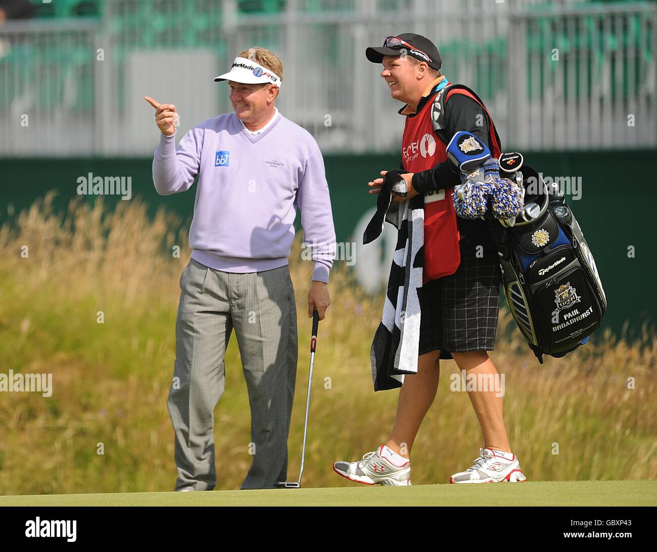 England's Paul Broadhurst (left) and his caddie on the 18th green