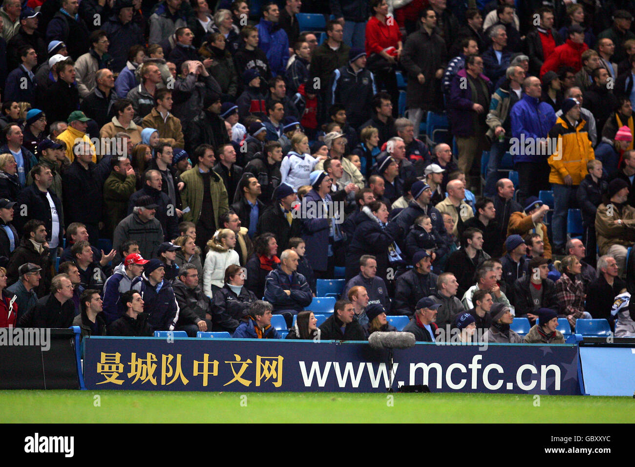 Soccer - Carling Cup - Third Round - Manchester City v Arsenal. Manchester City's fans shout at their team Stock Photo