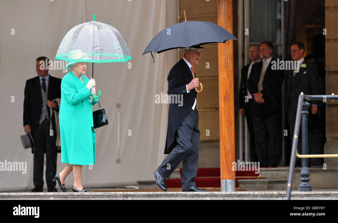 Queen Elizabeth II and the Duke of Edinburgh attend a summer garden party, at Buckingham Palace, London. Stock Photo