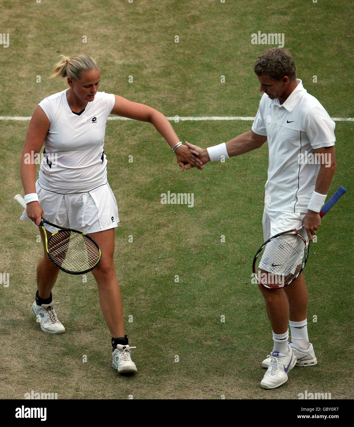 Tennis - 2009 Wimbledon Championships - Day Thirteen - The All England Lawn Tennis and Croquet Club. Bahamas' Mark Knowles and Germany's Anna-Lena Groenefeld during the Mixed Doubles final Stock Photo