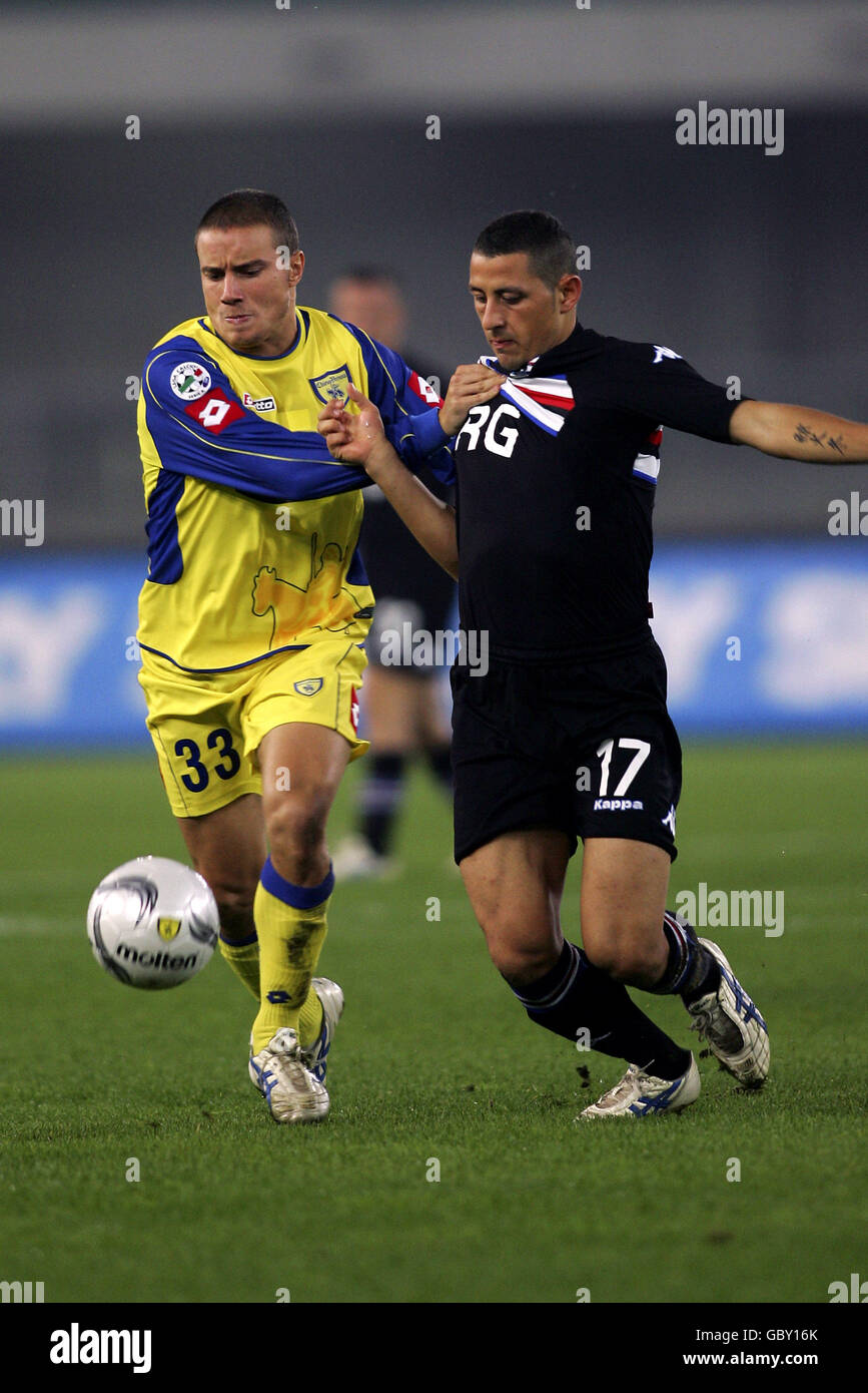 Chievo's Matteo Brighi and Sampdoria's Angelo Palombo (r) battle for the ball Stock Photo