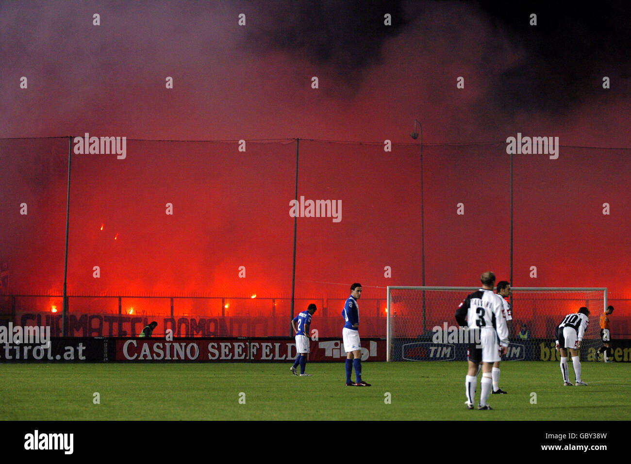 Soccer - Italian Serie A - Brescia v Siena. Siena fans set off flares at the Stadio Comunale Mario Rigamonti Stock Photo
