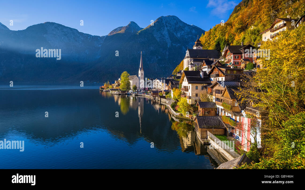 Scenic picture-postcard view of famous Hallstatt mountain village with Hallstaetter Lake in the Alps in fall at sunrise, Austria Stock Photo