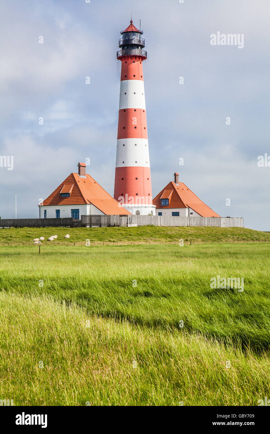 Famous Westerheversand lighthouse in the background at North Sea in Nordfriesland, Schleswig-Holstein, Germany Stock Photo
