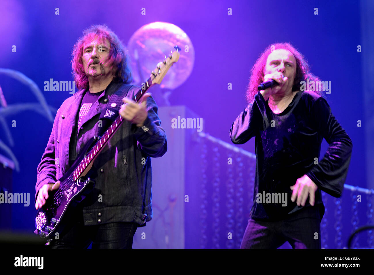 Geezer Butler and Ronnie James Dio of Heaven and Hell performs on stage on Day 1 of Sonisphere Festival at Knebworth. Stock Photo