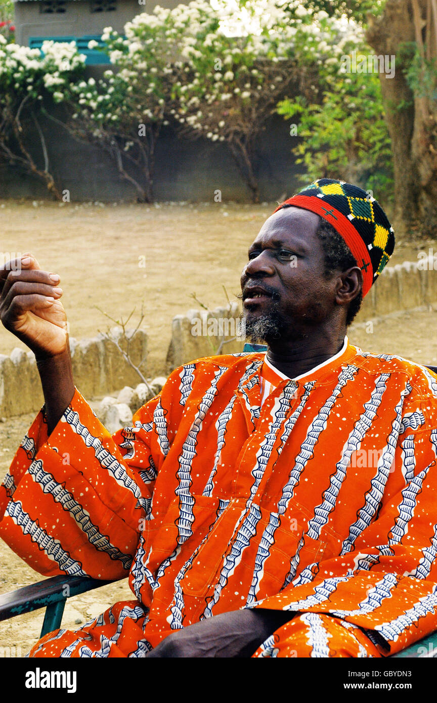 Portrait of a village chief in conversation with one of his friends