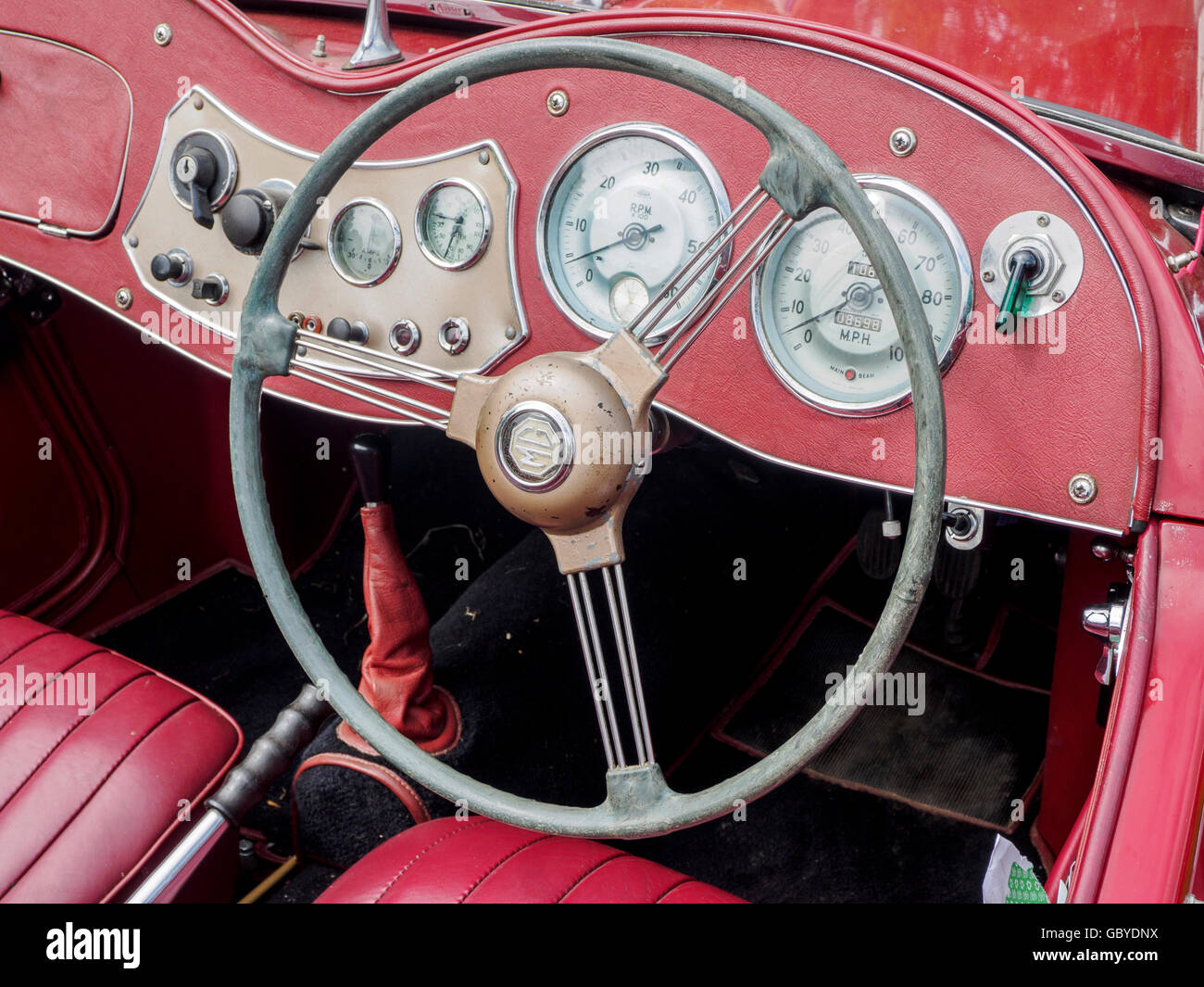 Steering wheel and dashboard of an MG TD sports car from the early