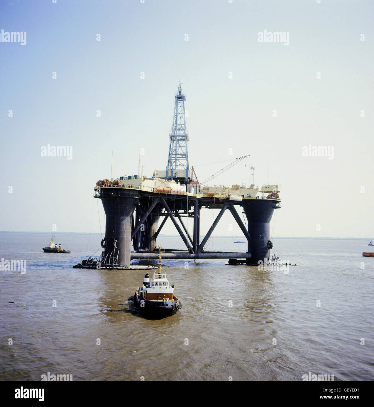 industry,oil,drilling platform on the sea,drilling platform Scarbeo 3,German Bight,circa 1970,1970s,70s,20th century,historic,historical,North Sea,drilling platform,oil rig,drilling platforms,oil rigs,Esso,Shell,swim,swimming,shaft tower,production derrick,shaft towers,production derricks,drilling derrick,wellhead,boring tower,boring trestle,drill tower,drill rig,drilling derricks,wellheads,boring towers,boring trestles,drill towers,drill rigs,platform,platforms,fixed offshore platform,crude oil,crude naphtha,raw oil,ba,Additional-Rights-Clearences-Not Available Stock Photo