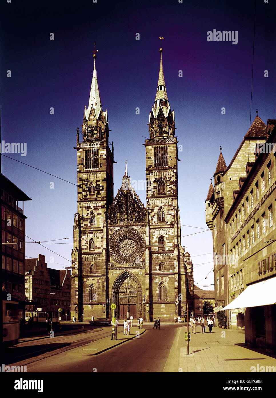 geography / travel, Germany, Bavaria, Nuremberg, St. Lawrence Church, west facade, built: 1237-1273, exterior view, circa 1950, 20th century, historic, historical, 1950s, 50s, Central Europe, west facades, church, churches, sacral, sacred, building, buildings, architecture, gothic, oculus, rosette, rosettes, street, old town, city centre, town centre, Lorenzkirche, people, 1940s, Additional-Rights-Clearences-Not Available Stock Photo