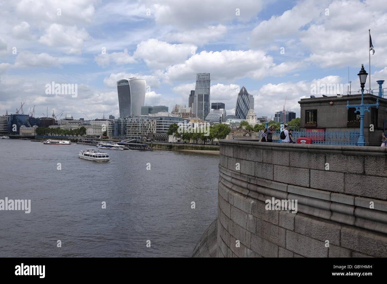 City of London CBD with The Walkie Talkie Cheese Grater and The Gherkin  London landmarks taken from Tower Bridge with the Thames in the foreground Stock Photo