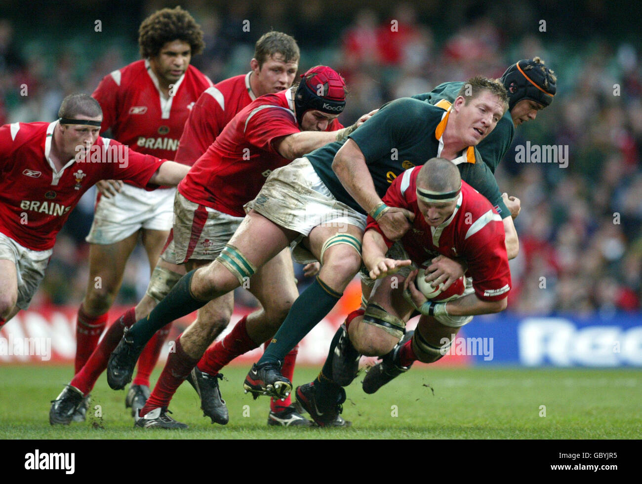 Brent Cockbain (Celtic Warriors) holds the ball as he is challeged during  the Celtic League match against Munster at Pontpridd Stock Photo - Alamy