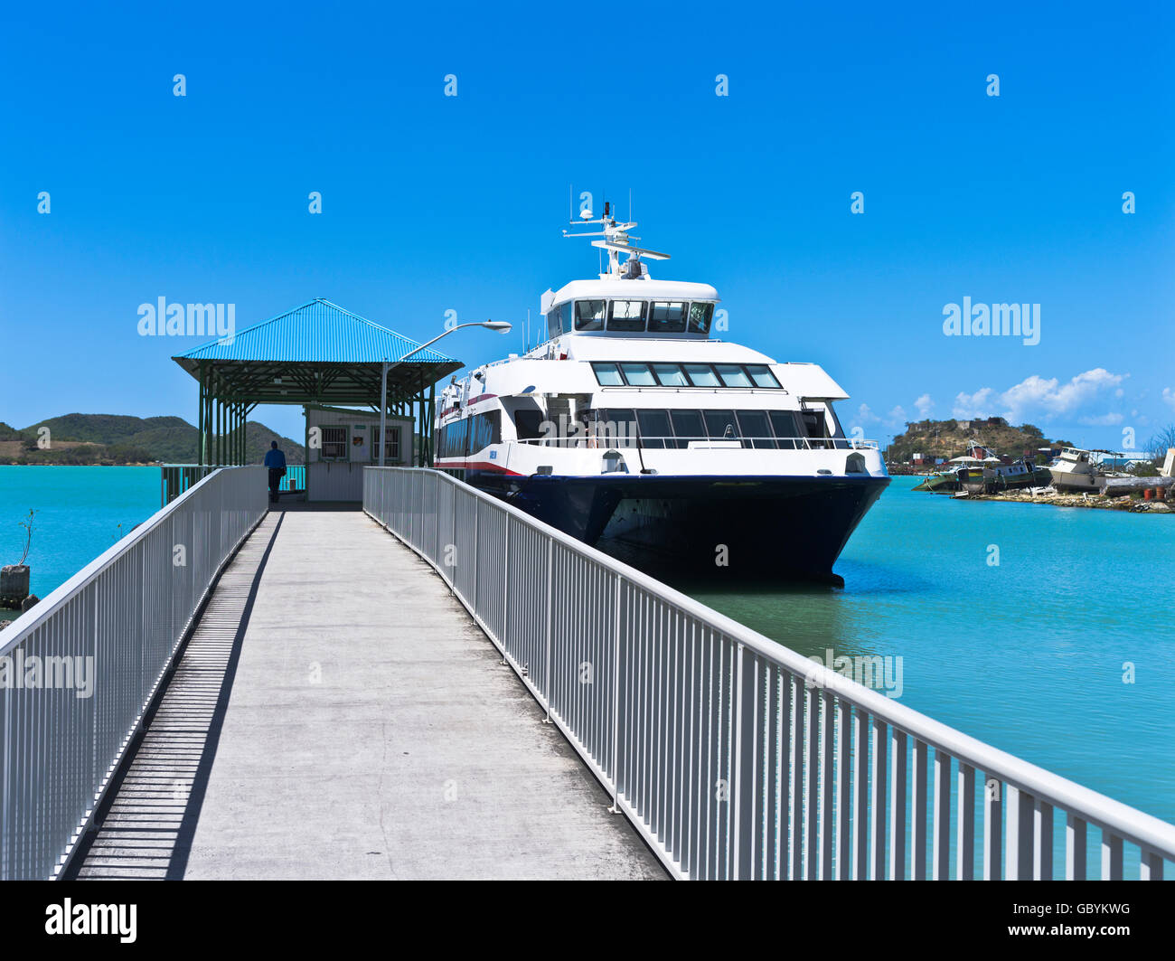 dh St Johns ANTIGUA CARIBBEAN Inter island ferry catamaran berthed at pier Saint Johns local ferries barbuda Stock Photo