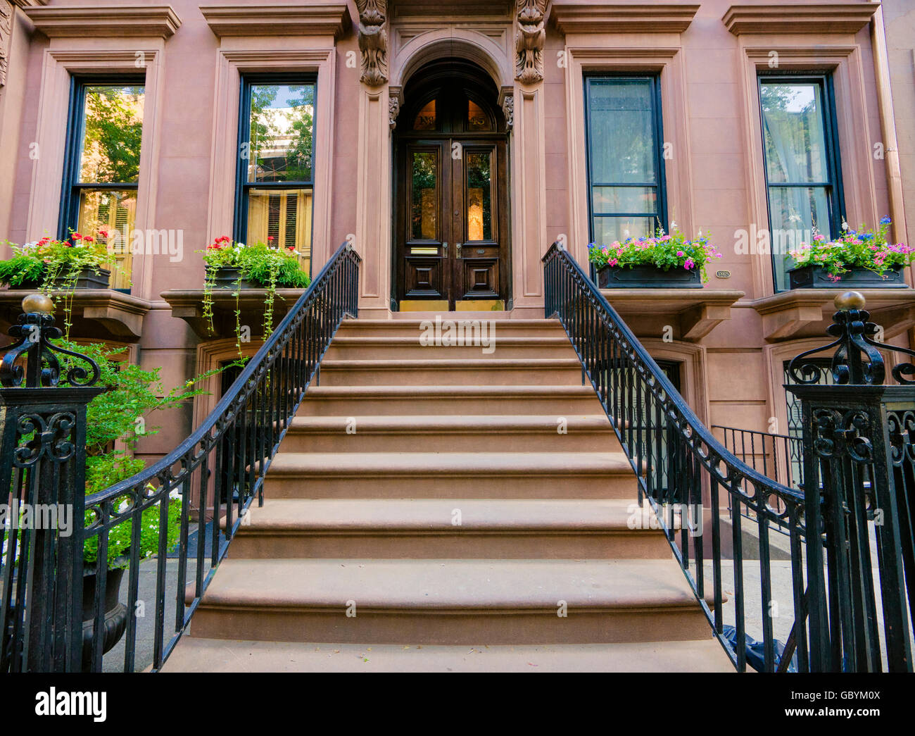 Lovely brownstone building with wrought iron banister in Brooklyn